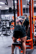 The Chaos T-Shirt back graphic in the gym